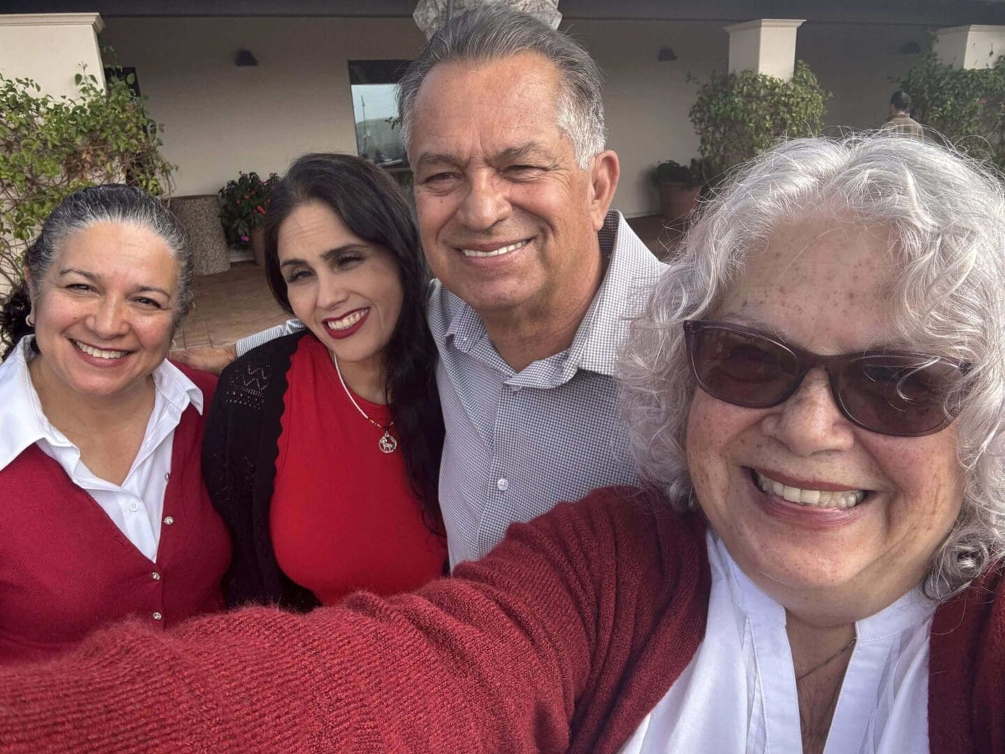 Group selfie with smiling older adults.